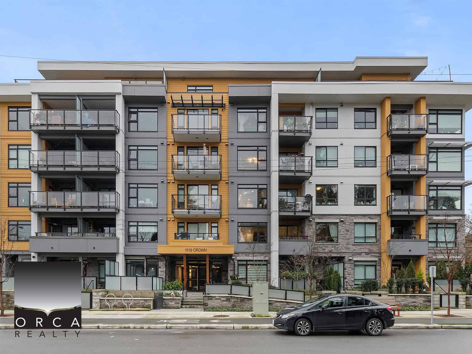 Modern multi-family residential building with balconies and contemporary design, located at 1519 Crown, Vancouver, showcasing luxury apartments and prime real estate investment opportunities.