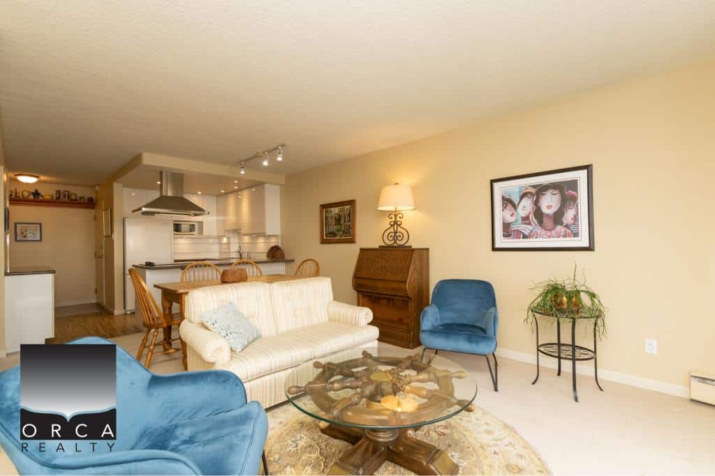 Warm, inviting living room in a Vancouver area home showcasing cozy furniture, tasteful décor, and open-plan design. Perfect for families and entertaining, with coastal-inspired accents for a relaxed ambiance.