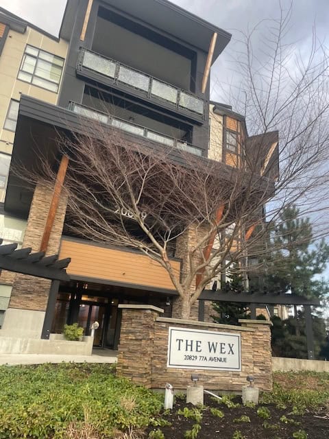 Contemporary multi-story residential building with modern architecture located at 20829 77A Avenue, Vancouver, showcasing upscale urban living.