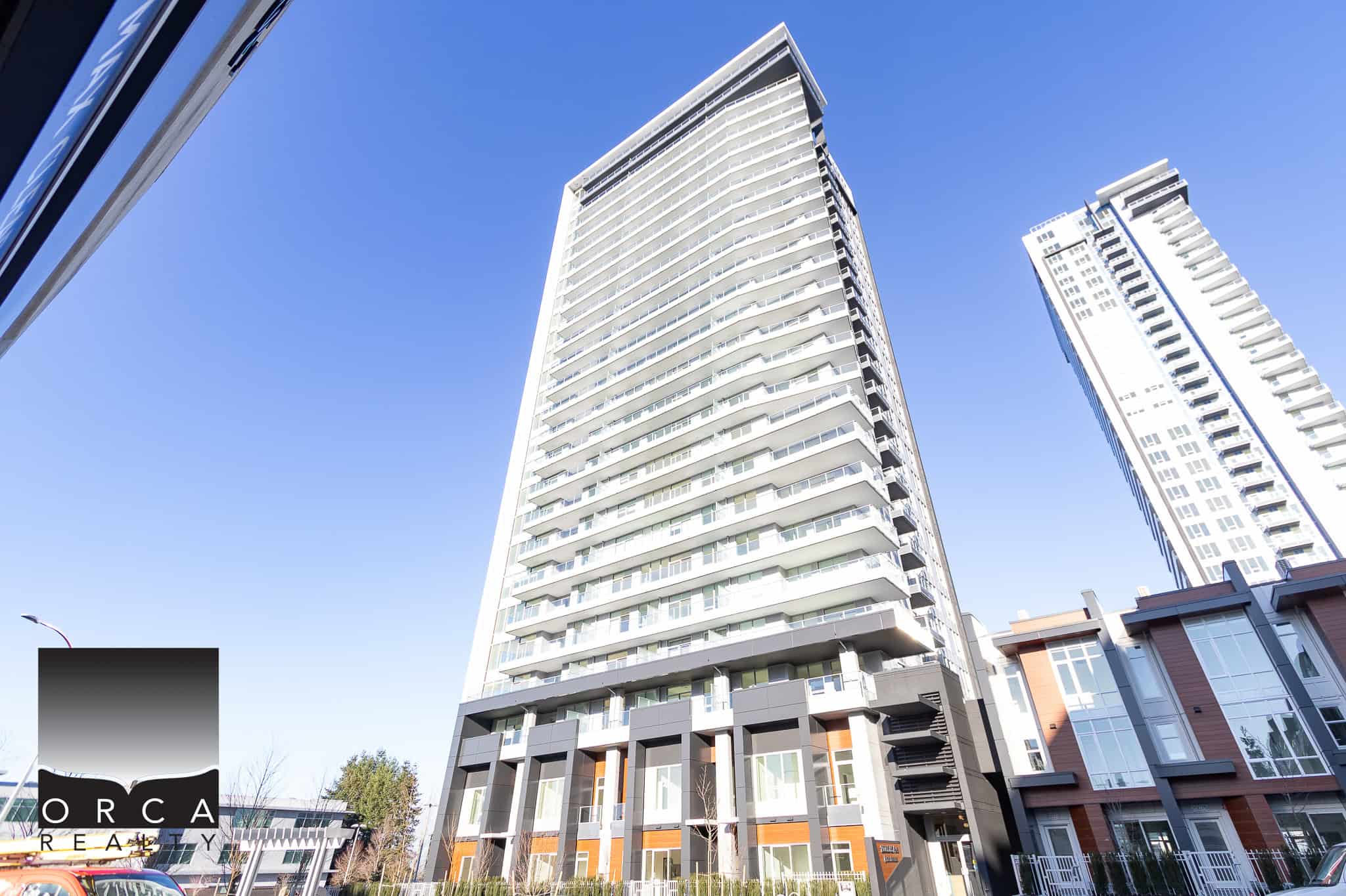 Modern high-rise residential buildings in Vancouver showcasing luxury apartments and condominiums for sale or rent, perfect for urban living.