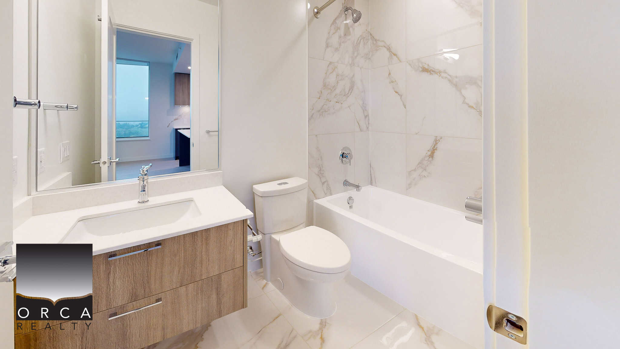 Modern bathroom with white marble accents, sleek vanity, and contemporary fixtures, perfect for luxury homes in Vancouver.