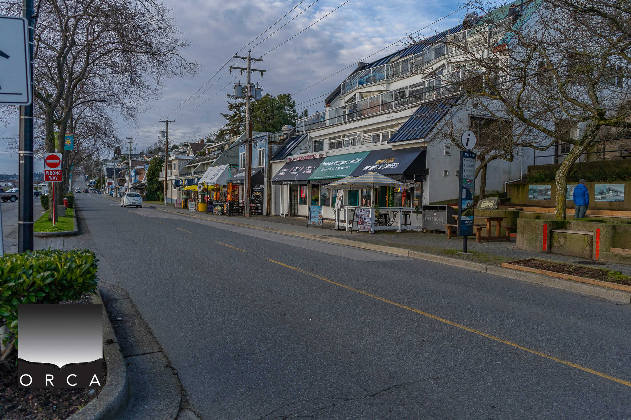 Vibrant street view in Campbell River, BC featuring local shops, cafes, and scenic waterfront views, reflecting community charm and real estate opportunities in Orca Realty Inc.