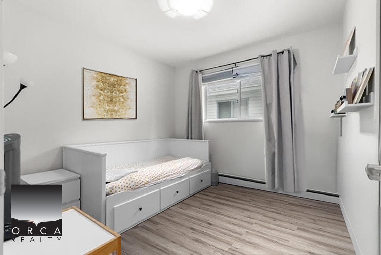 Bright and cozy bedroom featuring minimalist decor, white walls, a window with curtains, and a custom bed with storage drawers, perfect for Vancouver area homebuyers.