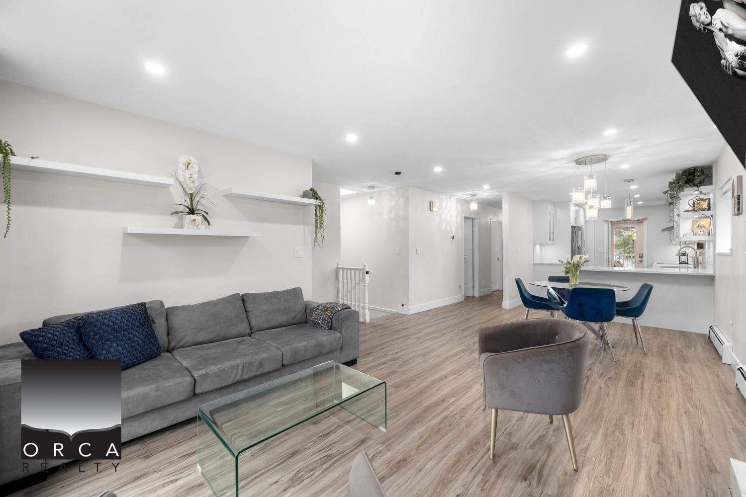 Bright and spacious living room in a modern Vancouver home with hardwood floors, contemporary decor, and an open-concept design, perfect for relax and entertaining.