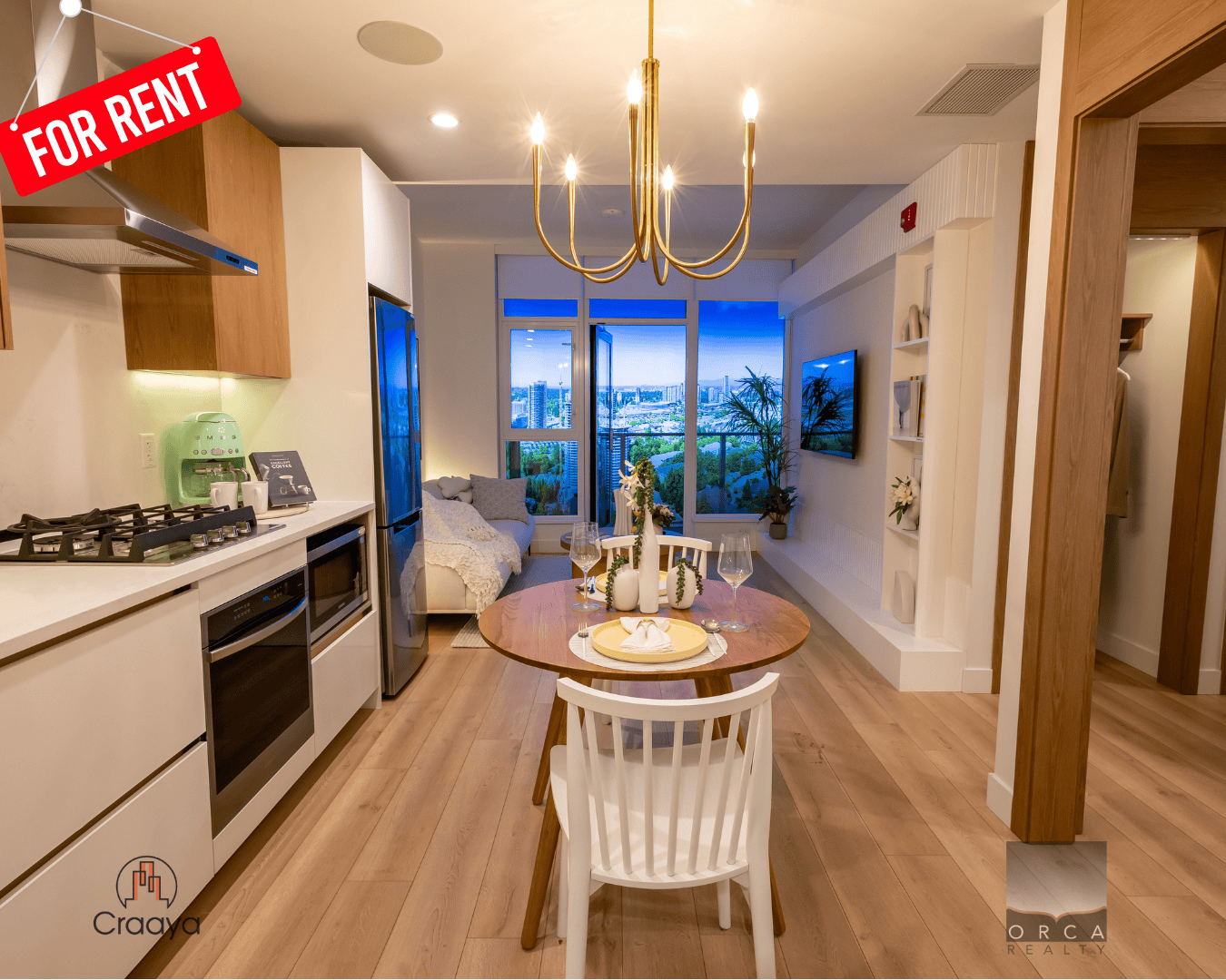 1 Modern kitchen and living room in a Toronto apartment for rent, featuring contemporary decor, hardwood floors, large windows with city views, and stylish furnishings, ideal for urban living.