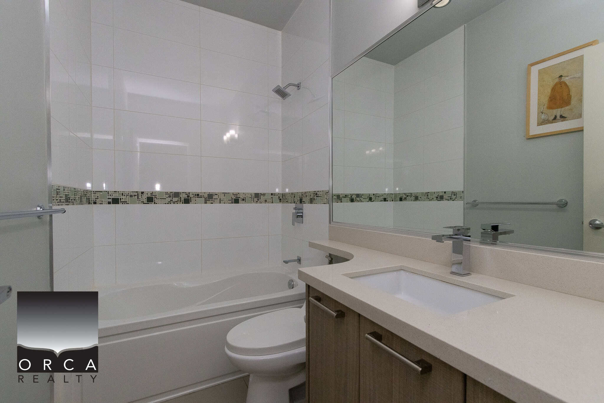 Modern bathroom with bathtub, walk-in shower, and contemporary fixtures featuring sleek design and elegant tile accents, ideal for Vancouver real estate listings.