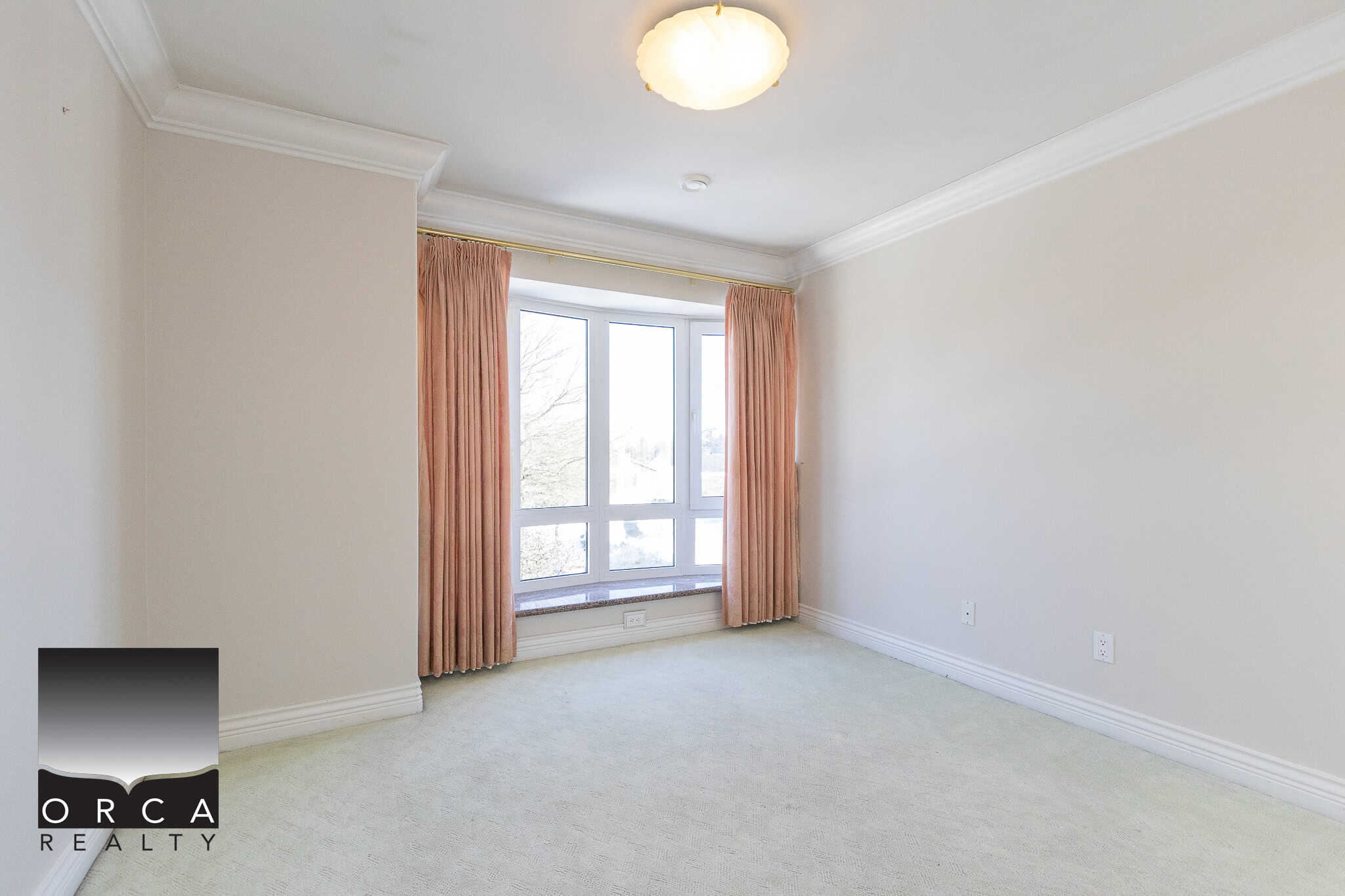 18 Bright, spacious bedroom with large window, peach curtains, and neutral decor, ideal for Vancouver homebuyers seeking comfortable and stylish property options.