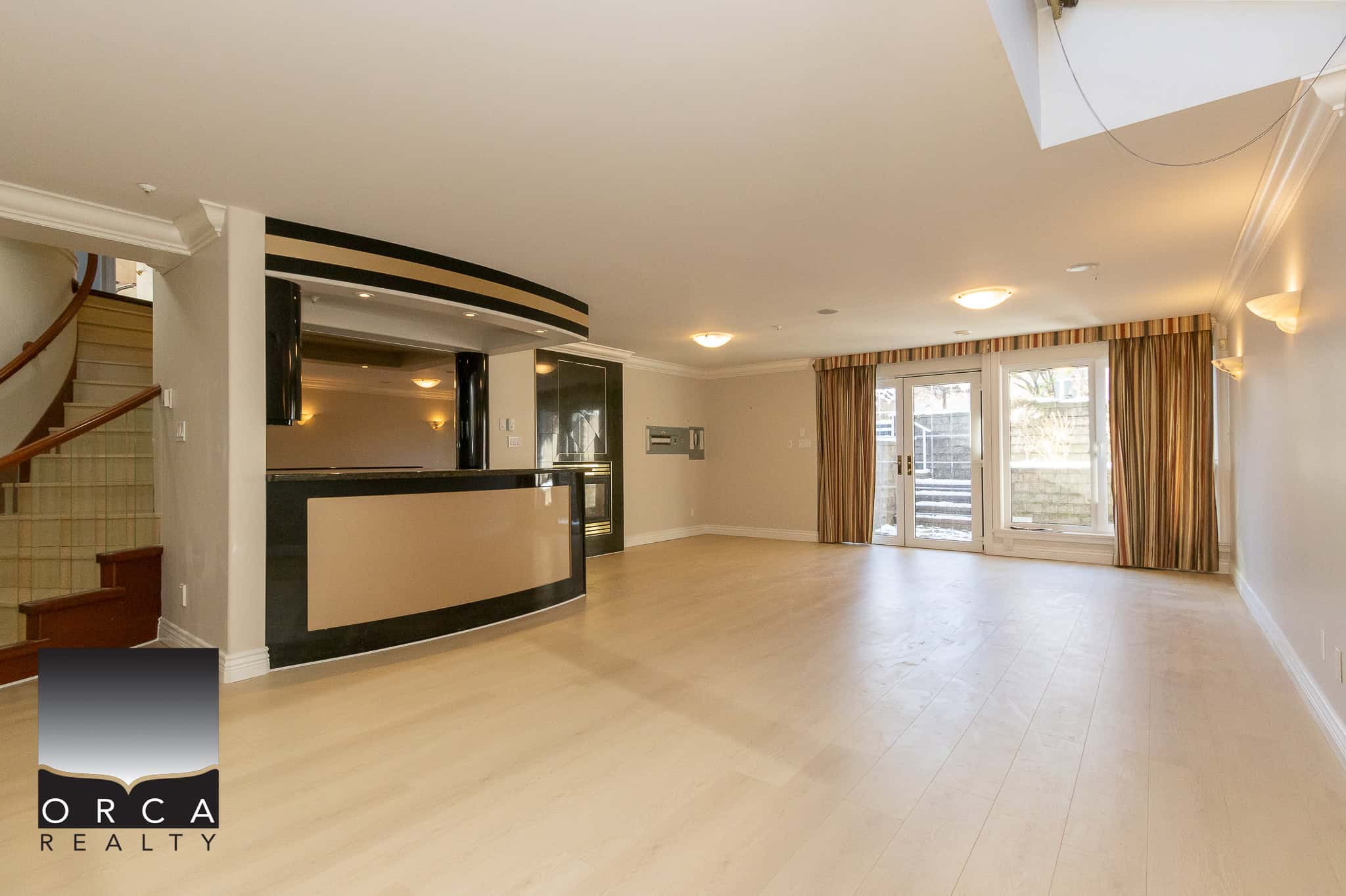 25 Spacious living area with large windows and sliding doors, modern interior design, and an open-concept layout perfect for family living and entertaining.
