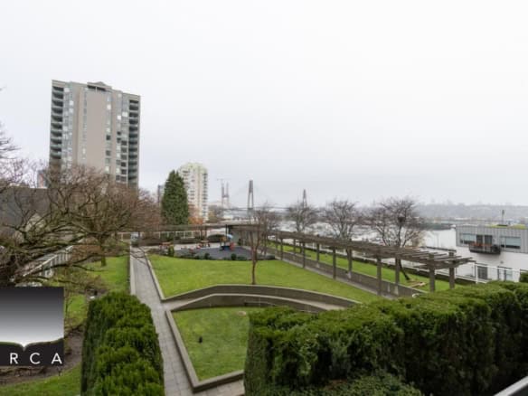 Modern waterfront apartment with scenic city and river views in Vancouver, BC. Convenient location, stylish interior, and access to outdoor terraces make it ideal for urban living.