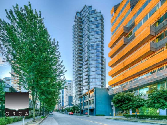 Modern high-rise residential buildings in downtown Vancouver, showcasing urban living with contemporary architecture and vibrant cityscape.
