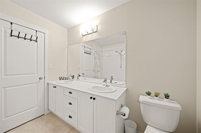 Bright bathroom with double vanity, modern fixtures, and clean design, ideal for Vancouver Island homes. Affordable real estate options with Orca Realty Inc.