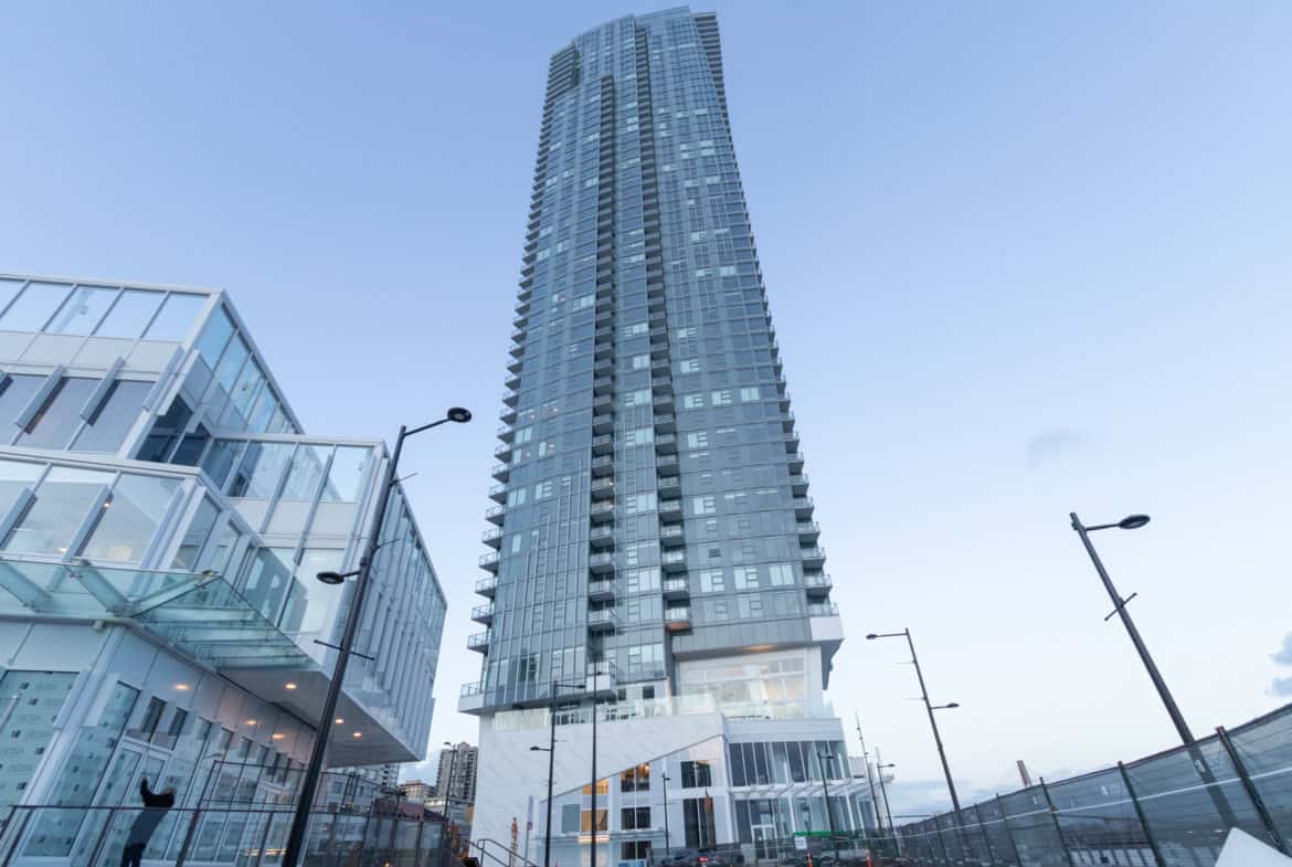 Contemporary high-rise residential building in downtown Toronto showcasing modern architecture and luxury living spaces. Ideal for real estate investments and luxury condo purchases.