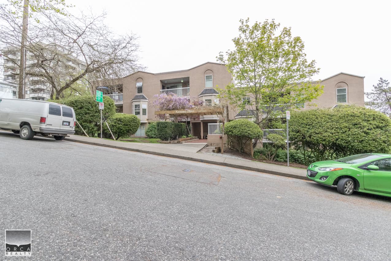Affordable Vancouver condo building with lush landscaping and prime location near urban amenities. Well-maintained, desirable residential complex showcasing vibrant community living.