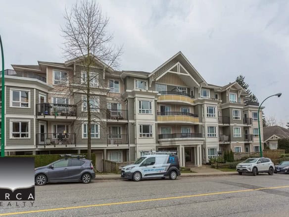 Elegant Vancouver apartment complex with modern architecture, spacious balconies, and lush landscaping. Perfect for buyers seeking a stylish and comfortable residence in a vibrant community.