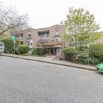 Spacious residential building with lush landscaping and parking available in a quiet neighbourhood, ideal for Vancouver-area homeowners seeking comfort and convenience.
