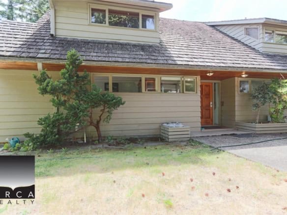 Charming Vancouver Island home for sale with landscaped yard, modern updates, and excellent neighborhood amenities. Perfect for families seeking a comfortable, stylish residence.