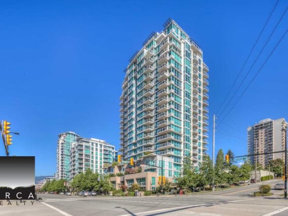 Contemporary high-rise condo building in Vancouver with floor-to-ceiling windows, spacious balconies, and urban amenities, ideal for downtown living.
