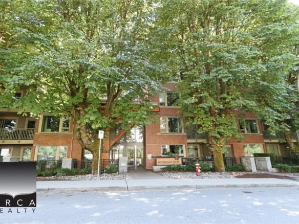 Lush green trees in front of a modern brick apartment building, showcasing Orca Realty Inc. Ottawa property listings, real estate services, and prime residential options in Ottawa, Ontario.