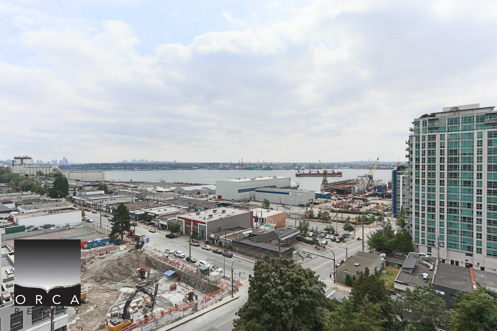 Modern high-rise condo with city and water views in Vancouver, BC – prime real estate by Orca Realty Inc.