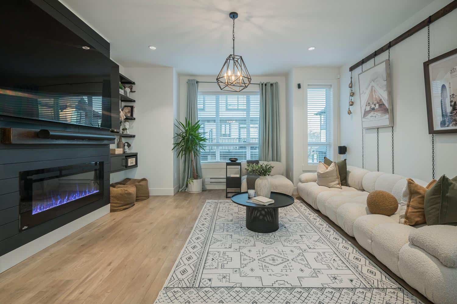 Cozy modern living room with natural light, stylish decor, and contemporary furnishings showcasing Orca Realty Inc. property listings in Vancouver, BC.