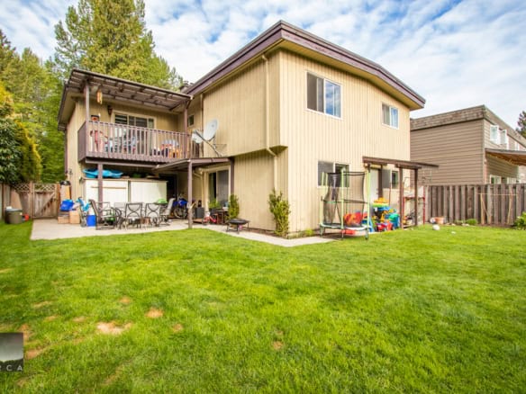 Bright two-storey family home with a spacious backyard and outdoor entertainment area located in a friendly neighbourhood in Victoria, BC. Perfect for families seeking suburban comfort.
