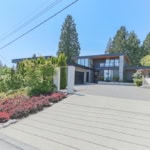 Modern luxury home in Vancouver with stunning architecture, landscaped yard, and innovative design, offered by Orca Realty Inc.