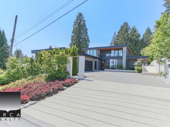 Modern luxury home in Vancouver with stunning architecture, landscaped yard, and innovative design, offered by Orca Realty Inc.