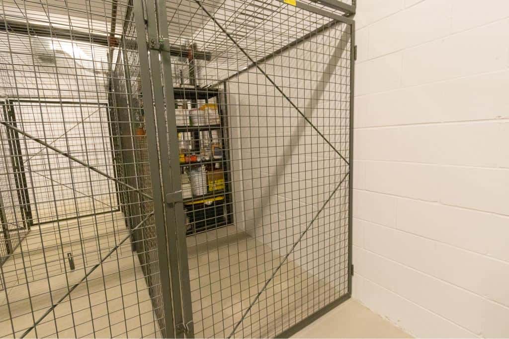 Secure metal storage cage for real estate properties at Orca Realty Inc. in Ontario, ideal for safekeeping and property management, showcasing professional real estate services.