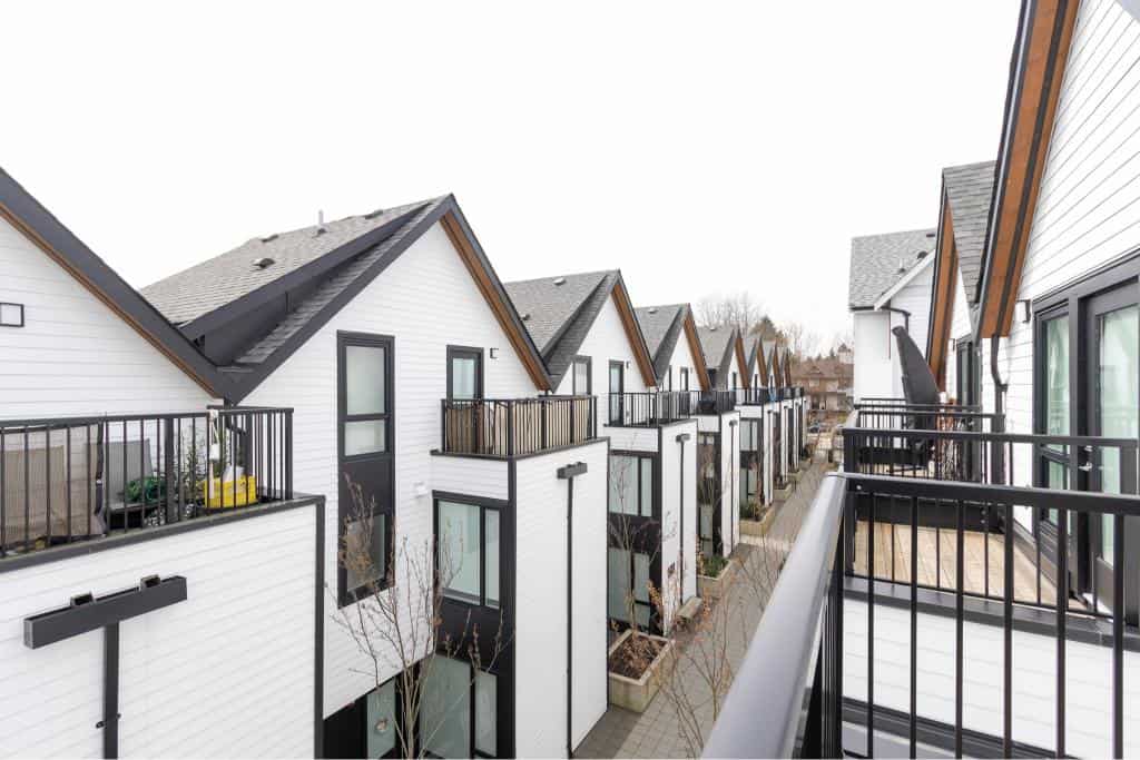 Modern townhouse row with spacious balconies and contemporary design in a residential community in Canada.