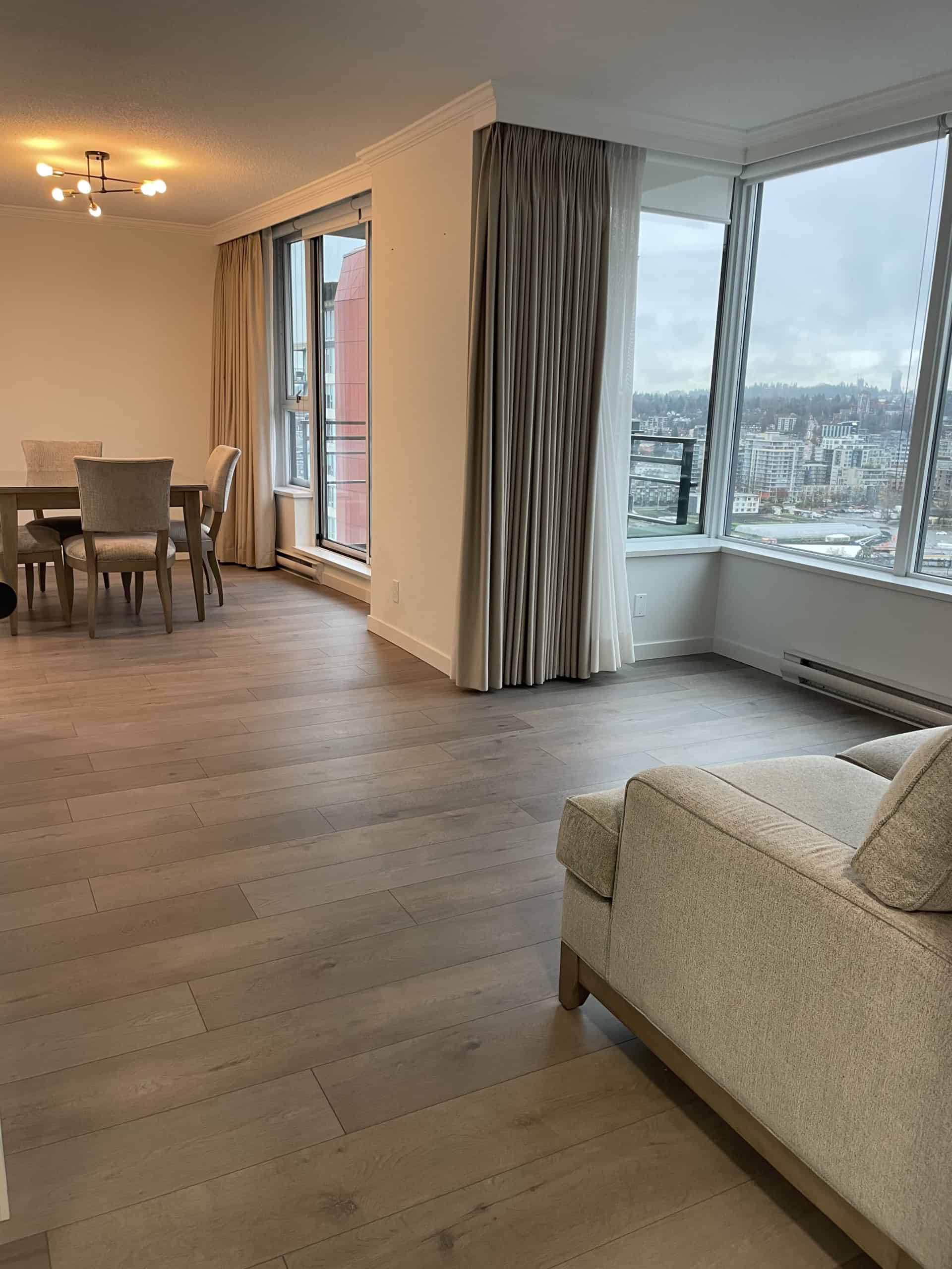 Bright, spacious downtown Vancouver apartment with large windows, modern furnishings, and panoramic city views, perfect for urban living and investment opportunities by Orca Realty Inc.