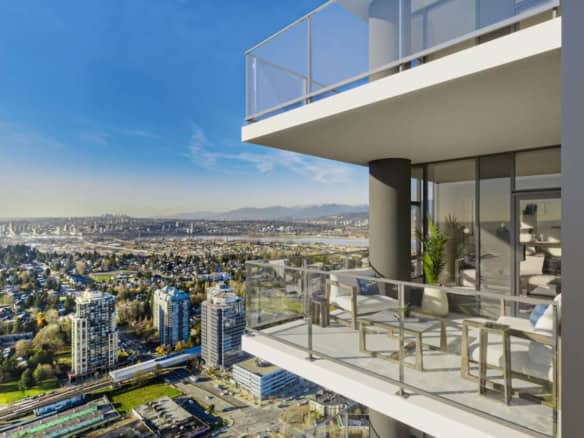 Spectacular city view from a modern high-rise balcony in Vancouver, showcasing luxury condo living with panoramic scenery and stylish outdoor furnishings.