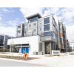 Modern multi-family residential building located at 19953 with contemporary architecture and eco-friendly design, ideal for real estate investment and urban living in Vancouver, BC.