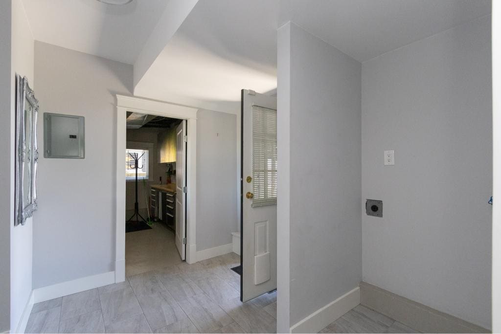 Bright interior view of a modern kitchen and laundry area in a Vancouver home by Orca Realty Inc., showcasing contemporary design, clean lines, and prime Vancouver real estate.