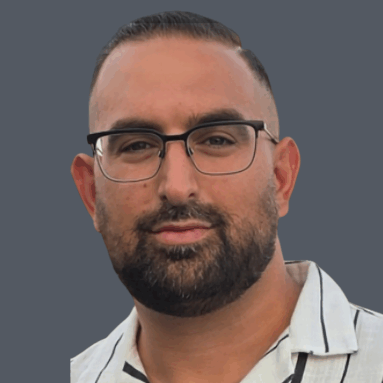 Professional real estate agent portrait representing Orca Realty Inc. with expertise in Vancouver Island property markets.