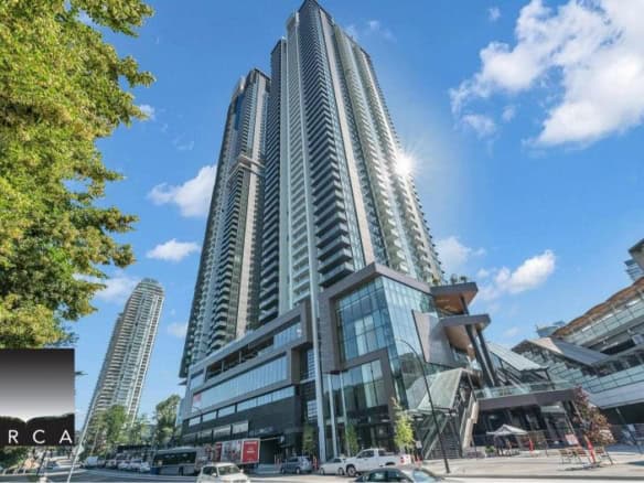Luxury high-rise condo building in downtown Vancouver showcasing modern architecture and city views.