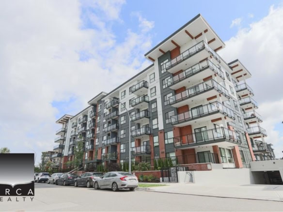Contemporary multi-storey residential building with balconies and modern design, located in a vibrant urban setting. Perfect for real estate investment or new homebuyers in the Greater Toronto Area.