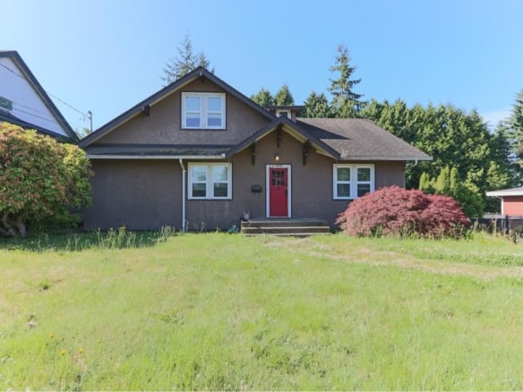 Charming single-family home with lush front yard in a desirable neighbourhood, featuring classic architecture and vibrant landscaping. Ideal for families seeking real estate in the area.