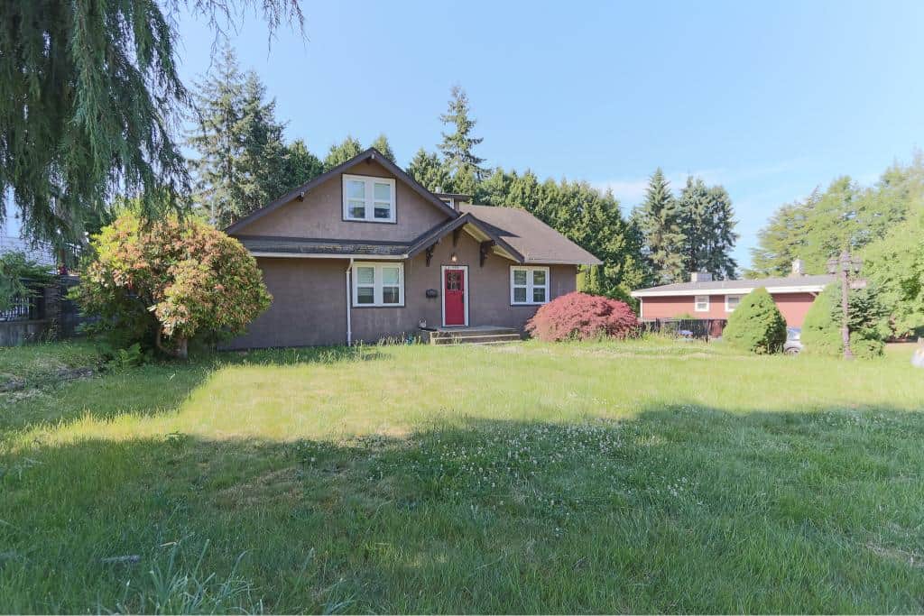 Bright, spacious house with lush greenery, established trees, and well-maintained garden, located in a peaceful neighbourhood perfect for families and real estate investment in the Victoria area.