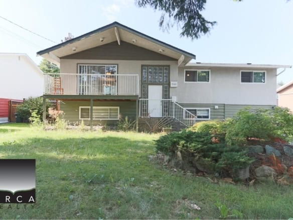 Spacious family home with a large backyard, modern exterior, and front garden perfect for outdoor living in a desirable neighbourhood. Ideal for families seeking a comfortable residence.