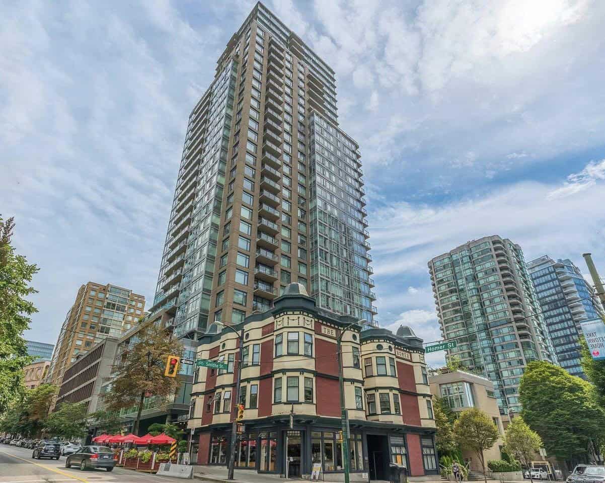 Homer 1 High-rise condo building in Vancouver, BC, modern residential skyscraper near downtown with balconies, glass facade, and urban surroundings.