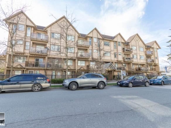 Spacious multi-unit residential building featuring modern architecture located in a vibrant neighbourhood, ideal for real estate investment or homeownership in the Greater Vancouver area.