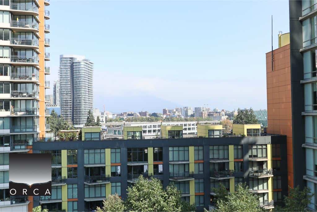 Modern urban condominium view with high-rise buildings and cityscape, ideal for Vancouver real estate, luxury apartments, and property investment.