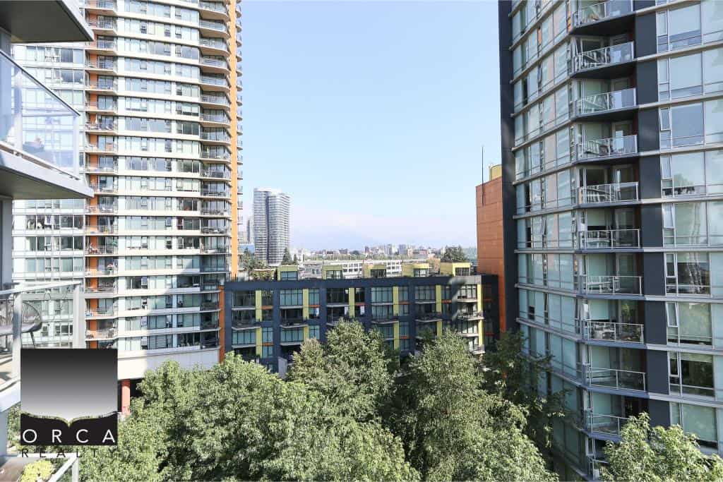 Modern high-rise condos with city views and urban living amenities in Vancouver, BC, showcasing premium real estate options from Orca Realty Inc.