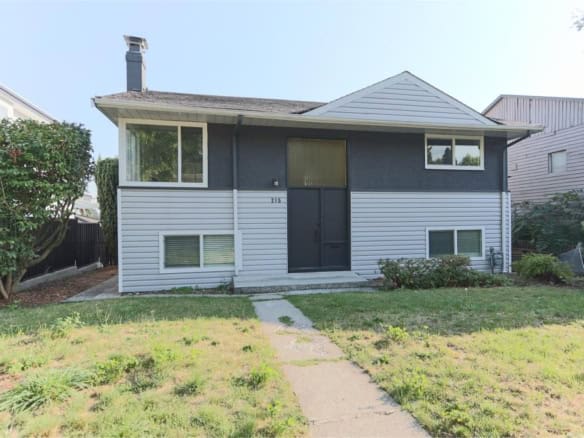 Charming duplex home listed by Orca Realty Inc. in a desirable neighbourhood, featuring a modern exterior, well-maintained yard, and convenient location for Vancouver Island real estate buyers.