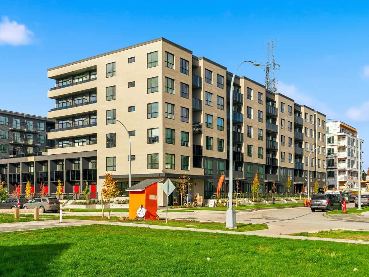Luxurious modern apartment building in Vancouver, BC, showcasing contemporary design and residential living options, ideal for real estate investment and homebuyers.