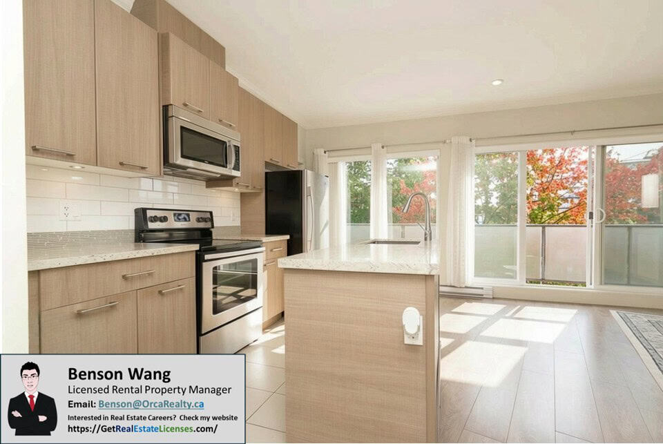 Bright modern kitchen with natural light, stainless steel appliances, and open concept layout in Vancouver BC. Perfect for realtor listings and homebuyers.