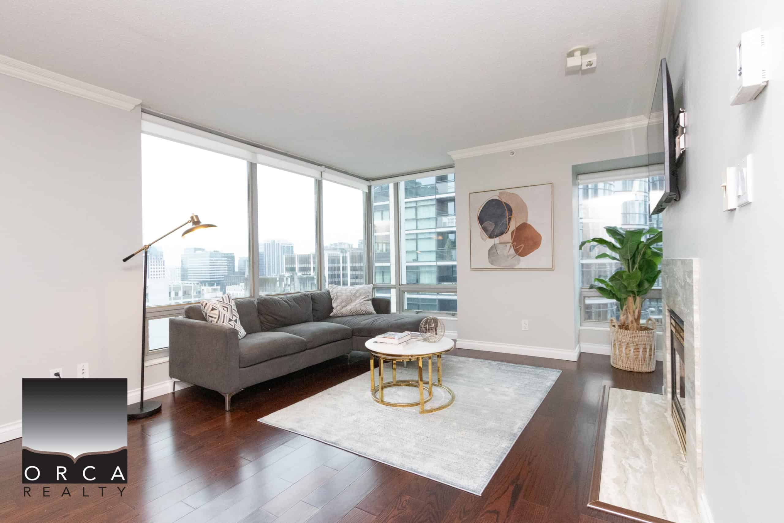 IMG_1749 Modern downtown Vancouver condo living with floor-to-ceiling windows, stylish decor, and panoramic city views, ideal for real estate investment or upscale lifestyle in Vancouver.