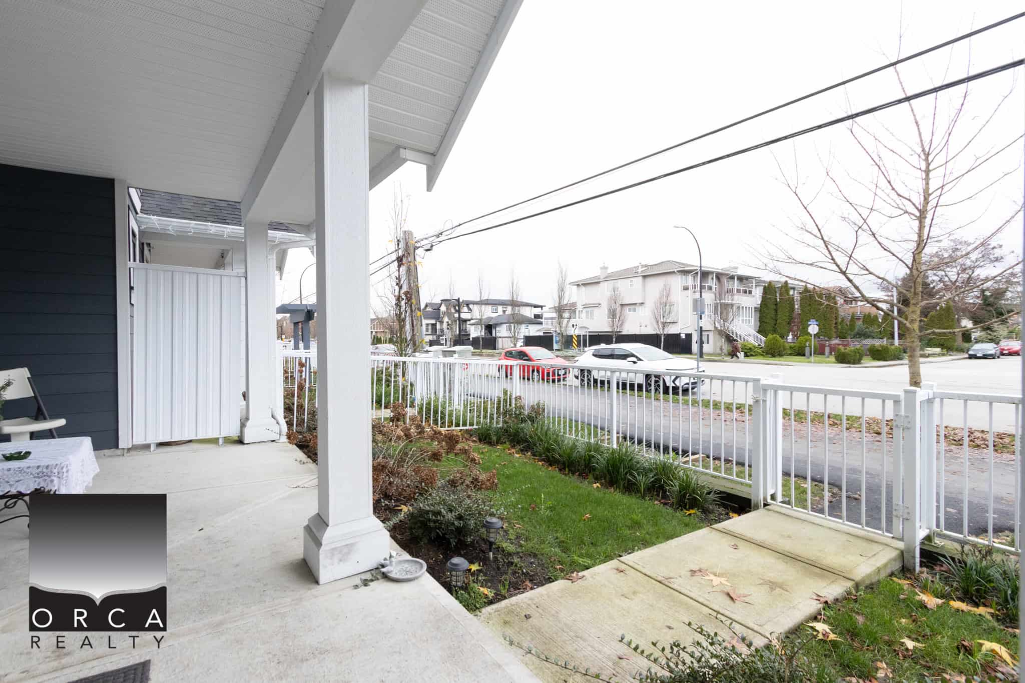 2 Cozy front porch with a view of a quiet residential street, ideal for relaxing and outdoor living in Victoria, BC. Perfect for homebuyers seeking a welcoming outdoor space.