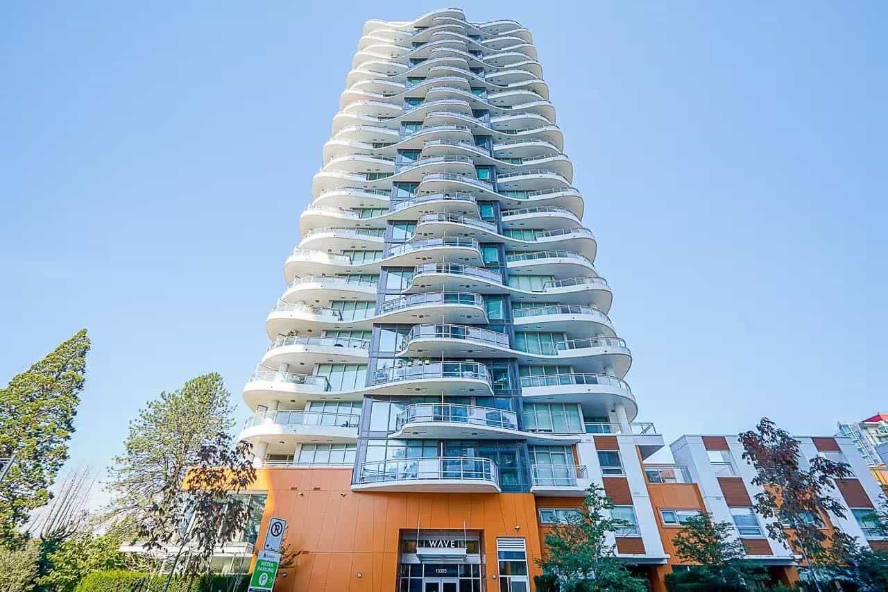 image6 Modern high-rise residential building in Vancouver with spacious balconies, prime location, and contemporary architecture. Perfect for luxury condo living and real estate investment in BC.
