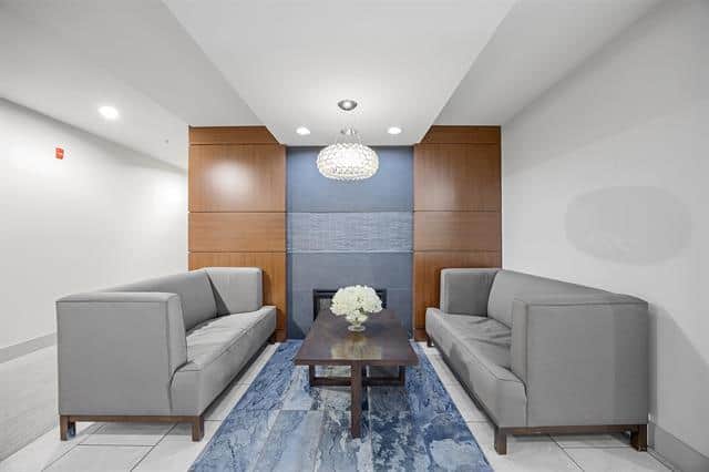 Modern real estate lounge with contemporary furniture, elegant lighting, and stylish decor, perfect for client consultations and property showings in Victoria, BC.